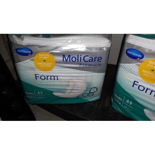 69 - 4 New Packets of Molicare Premium Incontinence Pads (Extra)