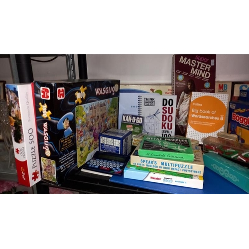 83 - A good lot of Games, Jigsaws & Suduko Books - Condition Unknown