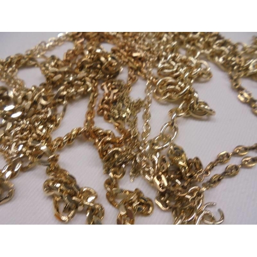 2071 - A quantity of yellow metal chains,