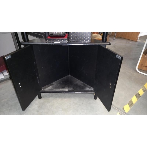 115 - A black corner display shelf unit with cupboard base