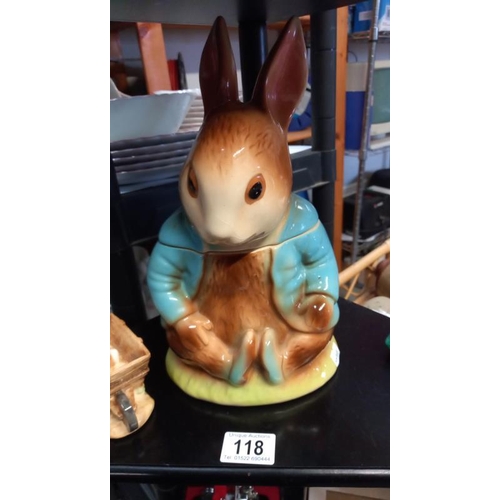 118 - A Peter Rabbit biscuit Jar (2 chips to inside of base) plus Peter Rabbit figure and Bunnikins figure