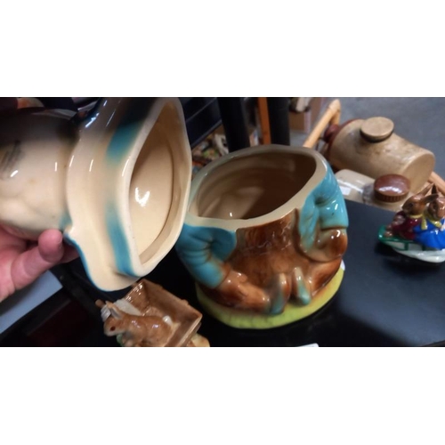 118 - A Peter Rabbit biscuit Jar (2 chips to inside of base) plus Peter Rabbit figure and Bunnikins figure