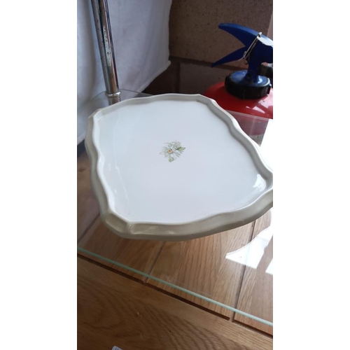 168 - A large pottery cheese dish