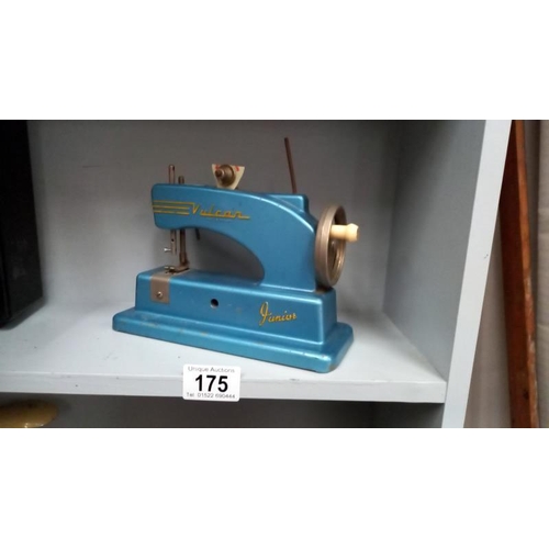 175 - A vintage Vulcan junior child's sewing machine