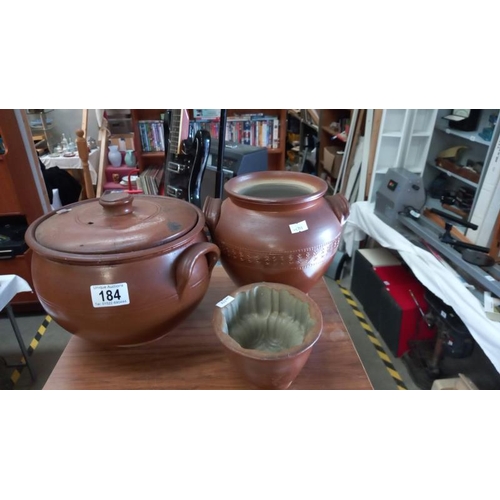 184 - A Stoneware cooking pot with lid and storage jar (no lid) & a Victorian Jelly Mould