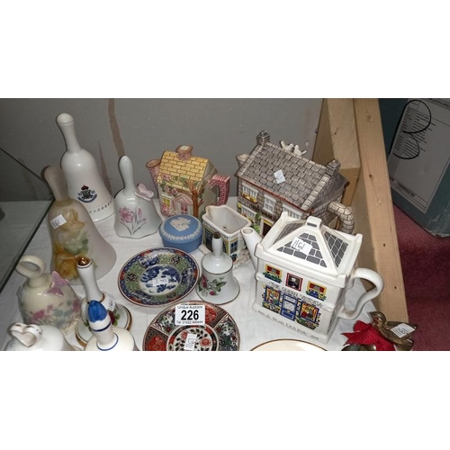 226 - A selection of bell ornaments, tea pots, Chinese Dishes