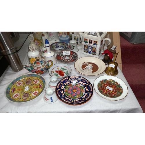 226 - A selection of bell ornaments, tea pots, Chinese Dishes