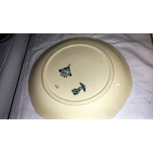 245 - A collection of aesthetic movement plates, tureen including poultry dish and steamer