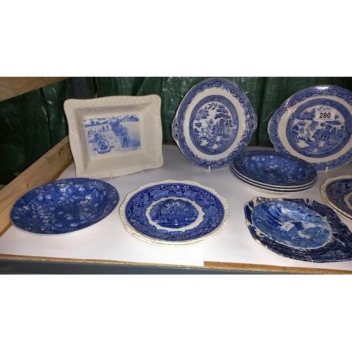 280 - A quantity of blue & white dishes/plates including 2 Shredded Wheat dishes