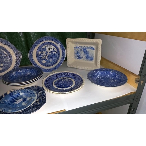 280 - A quantity of blue & white dishes/plates including 2 Shredded Wheat dishes