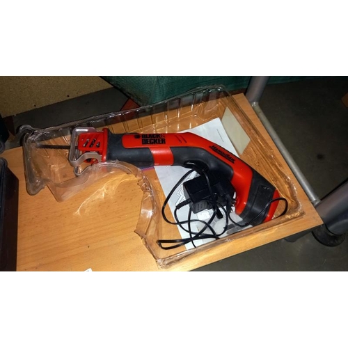 299 - A Black and Decker cordless reciprocating hand saw and a Black and Decker corded drill