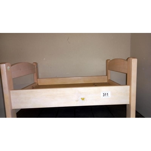 311 - A vintage wooden dolls bed - Collection only