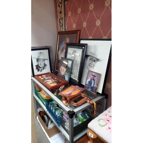 316 - A quantity of John Wayne related items including LE of 95 John Wayne knife a/f, bugle, plaque, frame... 