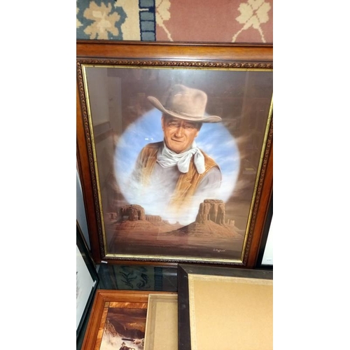 316 - A quantity of John Wayne related items including LE of 95 John Wayne knife a/f, bugle, plaque, frame... 