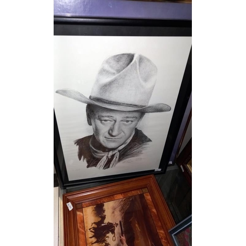 316 - A quantity of John Wayne related items including LE of 95 John Wayne knife a/f, bugle, plaque, frame... 