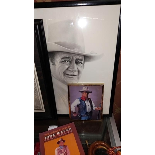 316 - A quantity of John Wayne related items including LE of 95 John Wayne knife a/f, bugle, plaque, frame... 