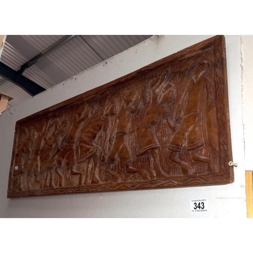 343 - A carved wood wall plaque - Collection only 86cm x 30cm