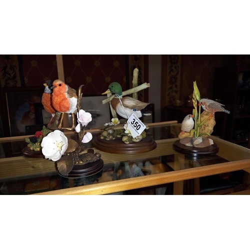 350 - A good selection of bird ornament including Country Artist