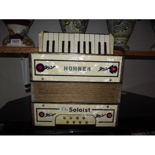 1032 - A Hohner soloist accordion