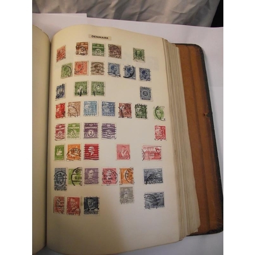 1022 - A stamp album containing some stamps