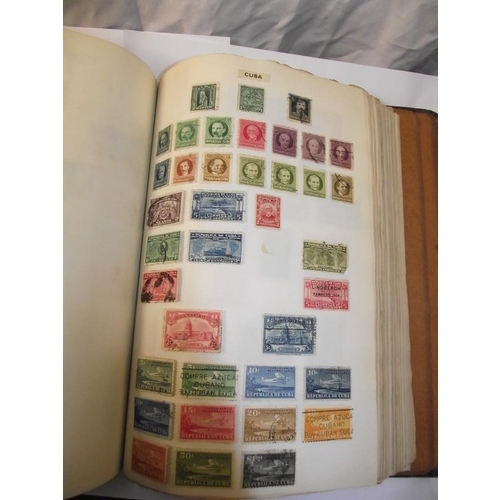 1022 - A stamp album containing some stamps