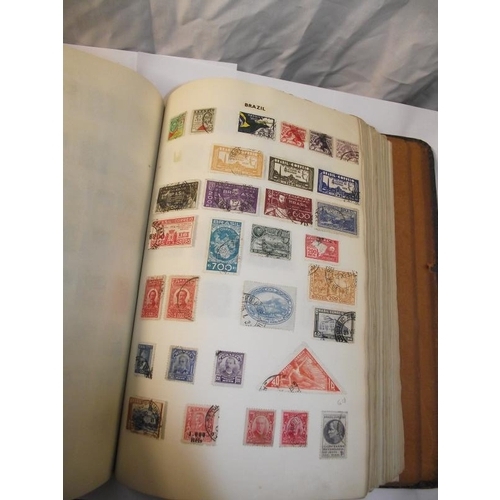 1022 - A stamp album containing some stamps