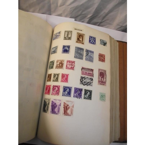 1022 - A stamp album containing some stamps