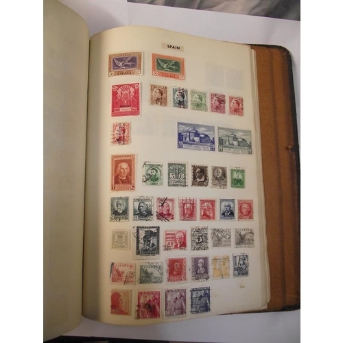 1022 - A stamp album containing some stamps