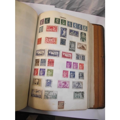 1022 - A stamp album containing some stamps