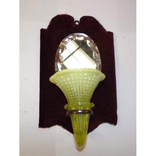 1060 - A Victorian wall hanging mirror with spill vase
