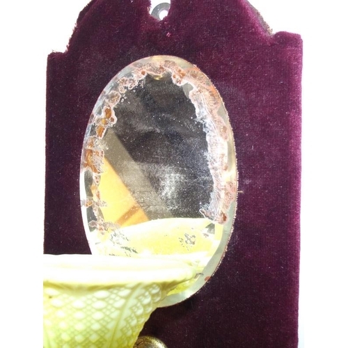 1060 - A Victorian wall hanging mirror with spill vase