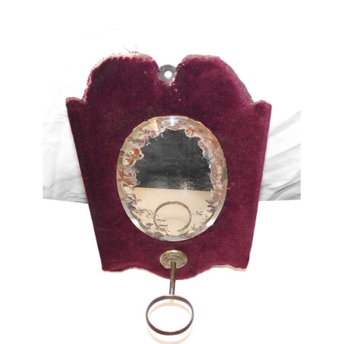 1060 - A Victorian wall hanging mirror with spill vase