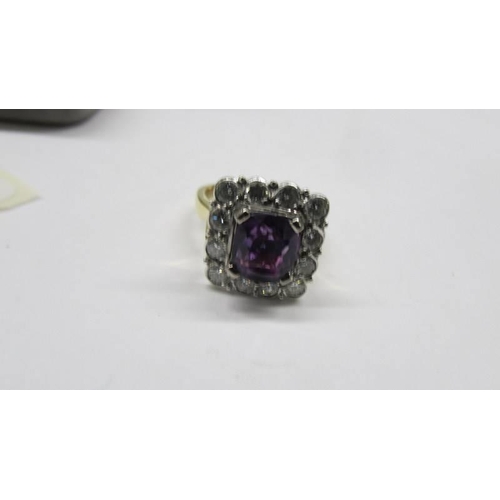 2030D - An 18ct gold amethyst and diamond ring, size J, total weight 8.2 grams.