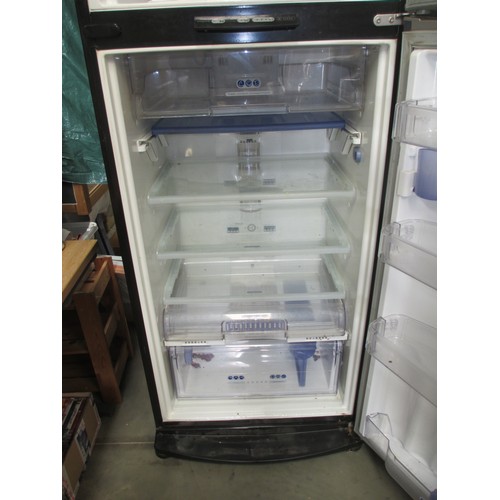 652 - A Whirlpool stainless steel fridge freezer