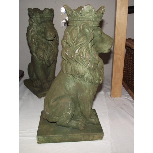 1178 - A pair of green verdigree cement garden lions height 36cm COLLECT ONLY