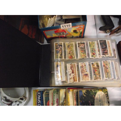 1119 - An album of tea and cigarette cards, quantity of tea card books and contents and a Weetabix stereo v... 