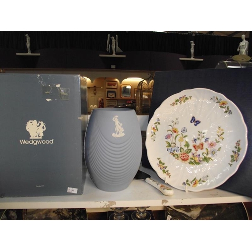 1131 - A large boxed vintage Wedgwood blue jasper vase, Royal Doulton collectors plates, boxed Aynsley and ... 