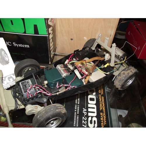 1135 - Tamiya Sand Rover and holiday buggy remote control cars and 3 boxed Acoms AP -227 and a Futalsa R/C ... 