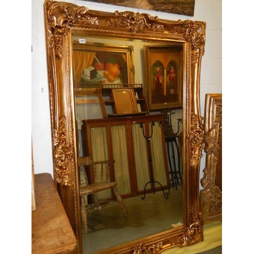 2653 - A large gilt framed bevel edged mirror, COLLECT ONLY.