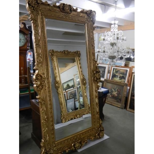 2660 - A tall gilt framed bevel edged mirror, 220 x 122cm, COLLECT ONLY.