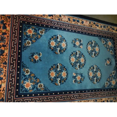 2690 - A vintage Persian blue wool rug, Approximately 128 x 178 cm, COLLECT ONLY.