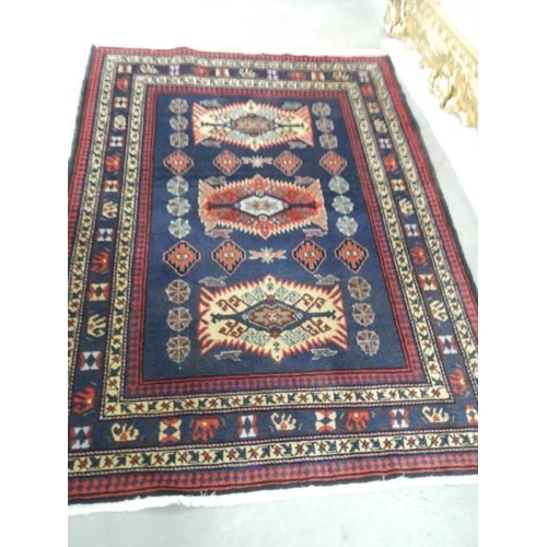 2691 - A vintage Persian red wool rug, Approximately 128 x 178 cm, COLLECT ONLY.