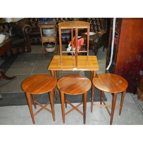 2694 - A nest of four teak drop side tables, COLLECT ONLY