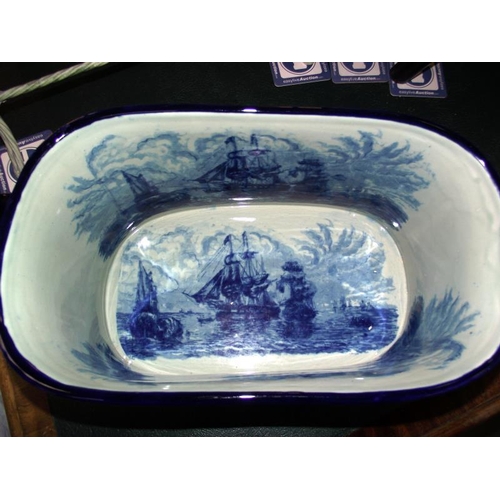 1257 - A large blue and white pottery footbath planter depicting ships COLLECT ONLY