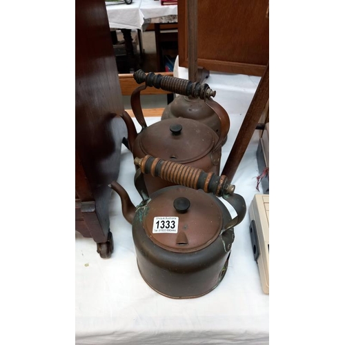 1333 - 2 copper kettles & a dolly posher, COLLECT ONLY