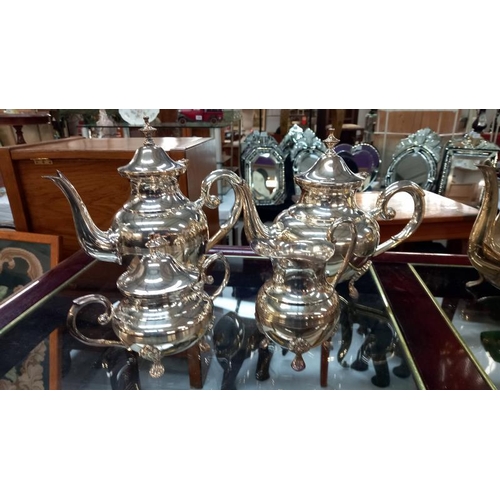 1338 - Two 4 piece silver plated tea sets