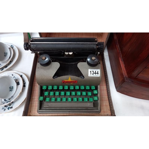 1344 - A vintage Lilliput typewriter, COLLECT ONLY