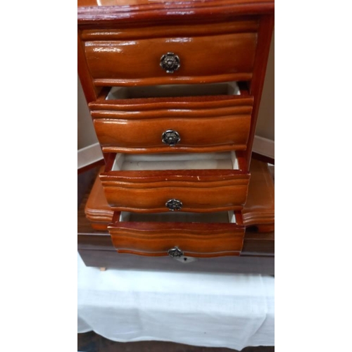 1347 - A vintage lacquered musical jewellery box & 1 other