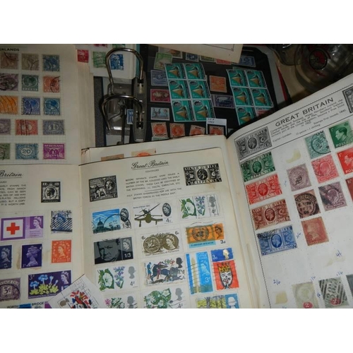 10 - A good lot of albums of stamps. one shelf.