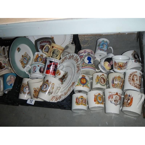 12 - A good lot of commemorative cups and mugs.